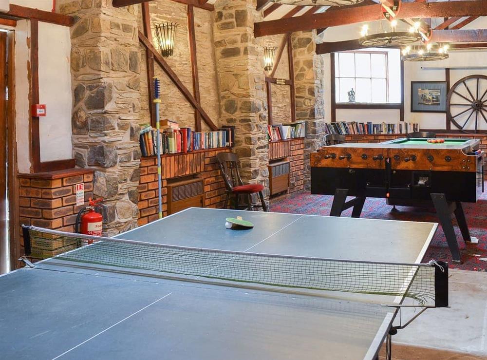Shared games room with many activities for a rainy day at Manor Cottage, 