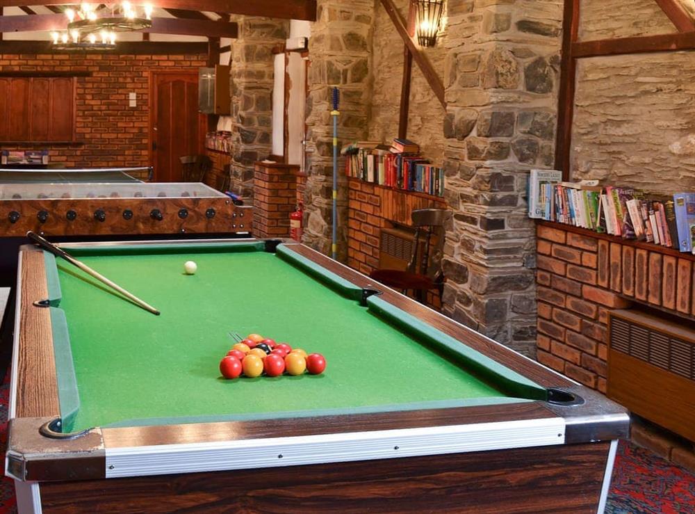 Shared games room with traitional pub games at Manor Cottage, 