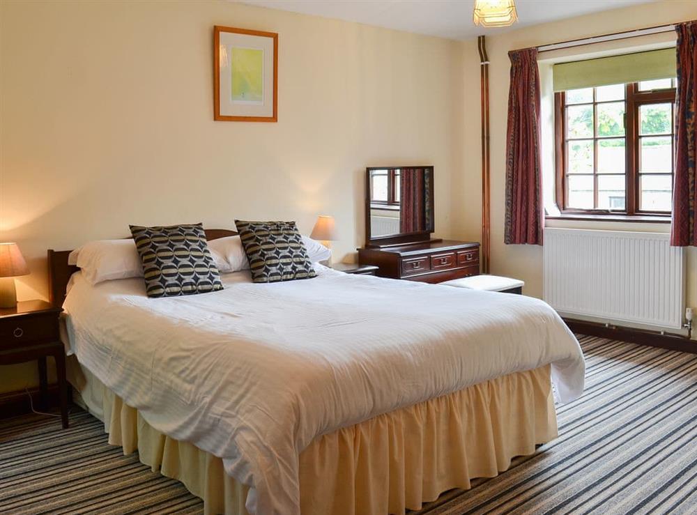 Ground floor double bedroom with en-suite at Mill Cottage, 