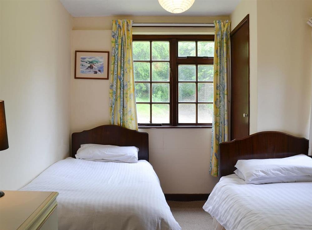 Warm and cosy twin-bedded room at Mill Cottage, 