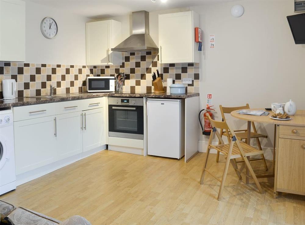 Spacious kitchen and dining room at Paddock Cottage, 
