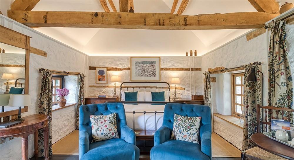 The sleeping area of Old Slaughter House, Oxfordshire at Trinity Cottage in Exeter, Devon