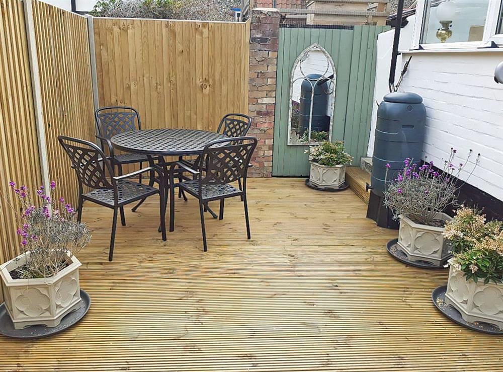 Attractive decked patio area at Trinity Cottage in Wells-next-the-Sea, Norfolk