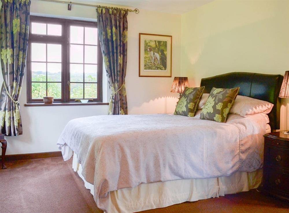 Welcoming double bedroom at Tripp Cottage in St Neot, near Liskeard, Cornwall