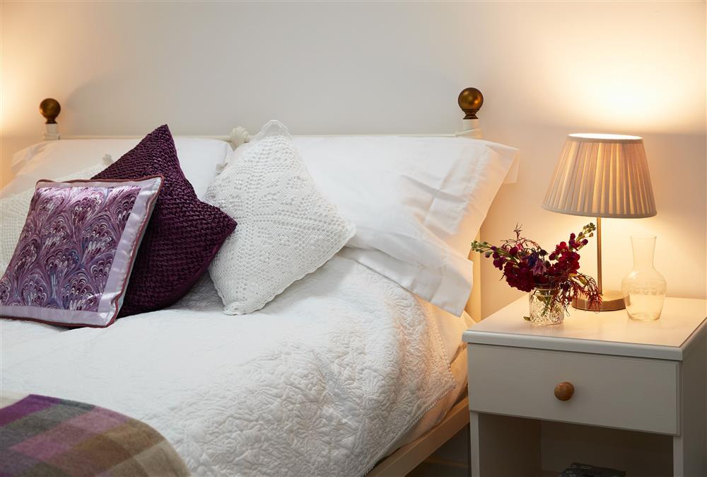 Bedroom one with a double bed and en-suite shower room at Troedrhiwfawr, Aberystwyth