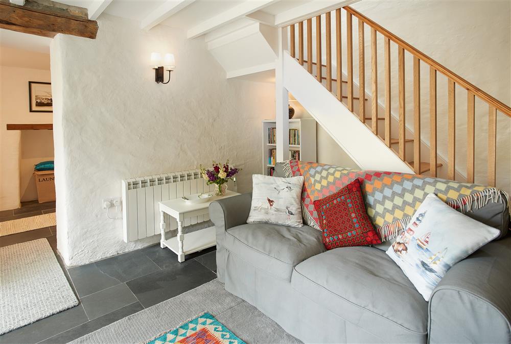 Comfortable sitting room with doorway leading to study area at Troedrhiwfawr, Aberystwyth