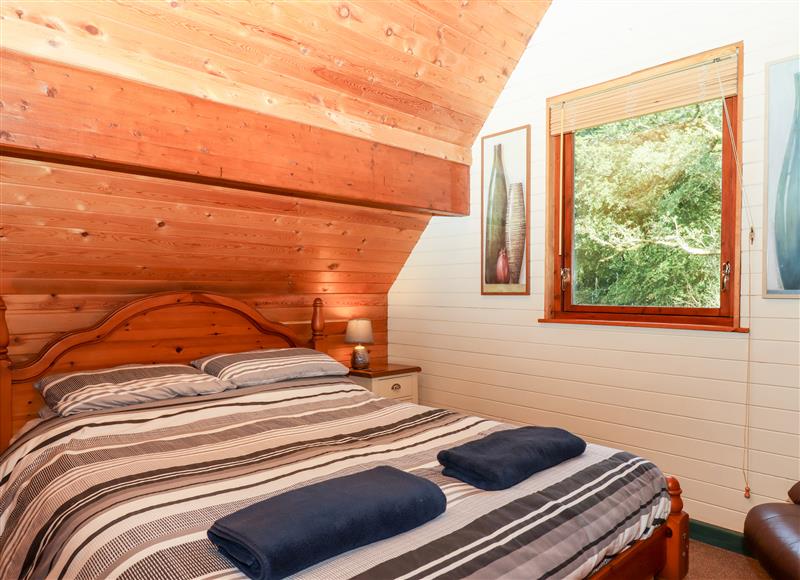A bedroom in Trout River Retreat at Trout River Retreat, Clifford Bridge near Moretonhampstead