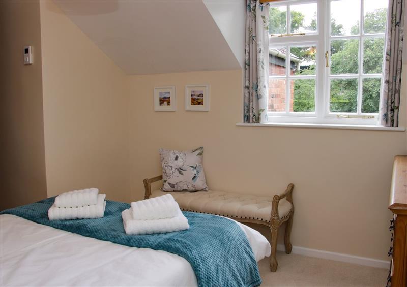 A bedroom in Troutbeck Cottage at Troutbeck Cottage, Ludlow