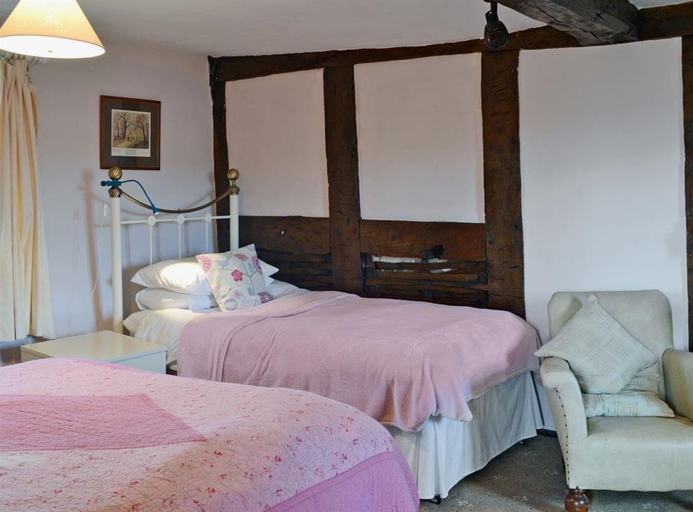 Comfortable family bedroom at Trowley Farmhouse in near Painscastle, Hay-on-Wye, Powys