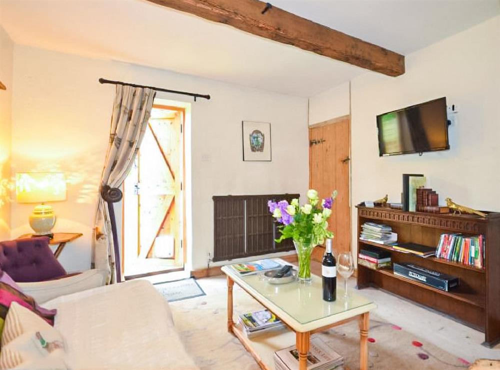Enjoy the living room at Truffle Cottage in Chichester, West Sussex