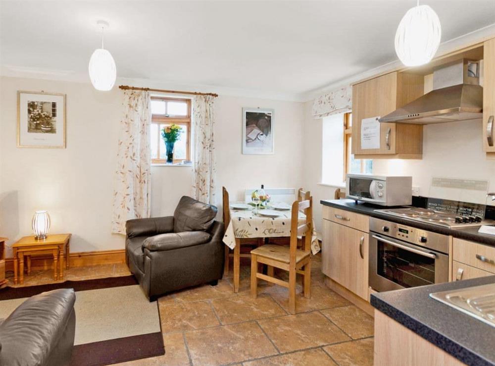 Open plan living/dining room/kitchen (photo 2) at Truman Cottage in Filey, North Yorkshire