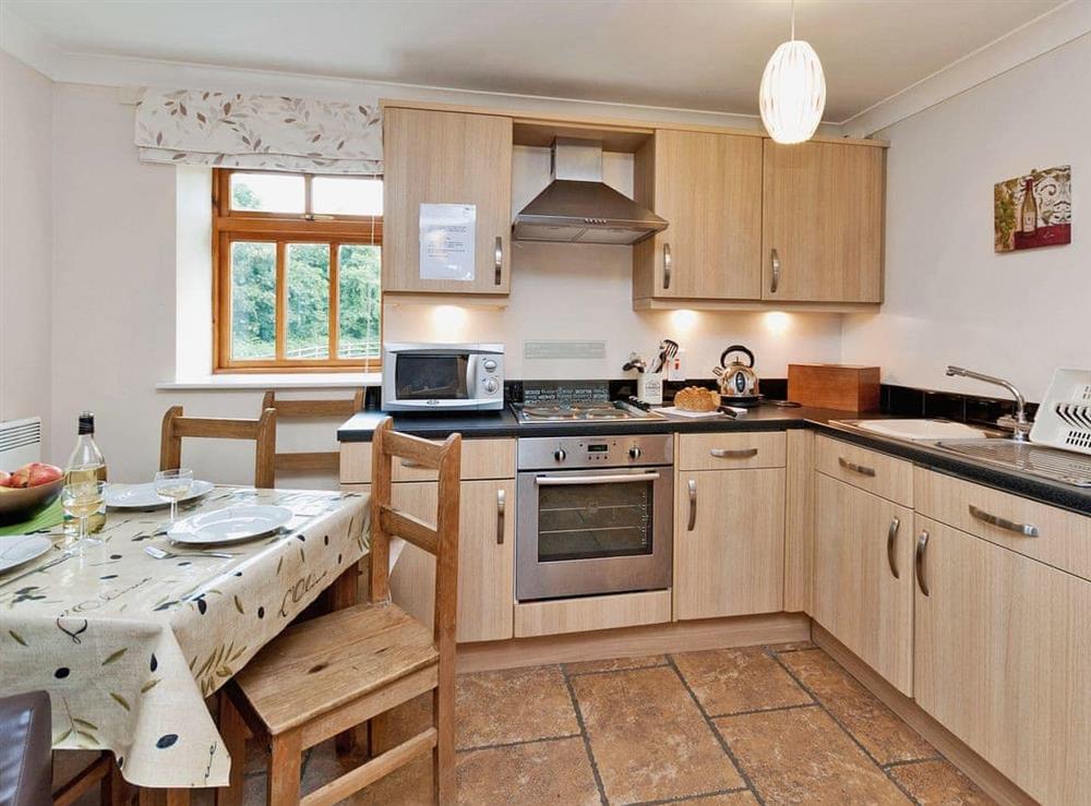 Open plan living/dining room/kitchen (photo 3) at Truman Cottage in Filey, North Yorkshire