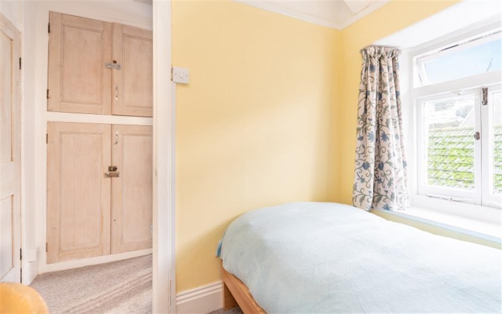 The single bedroom on the top floor at Tuc Tin Cottage in Looe