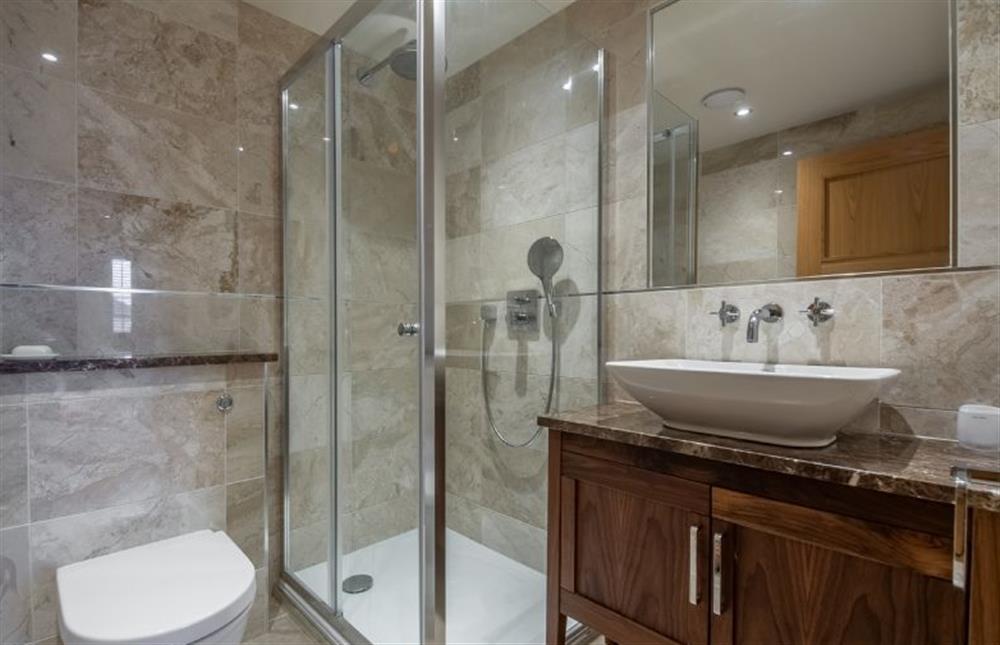 Ground floor: En-suite shower room at Tucked Away Cottage, Langham  near Holt