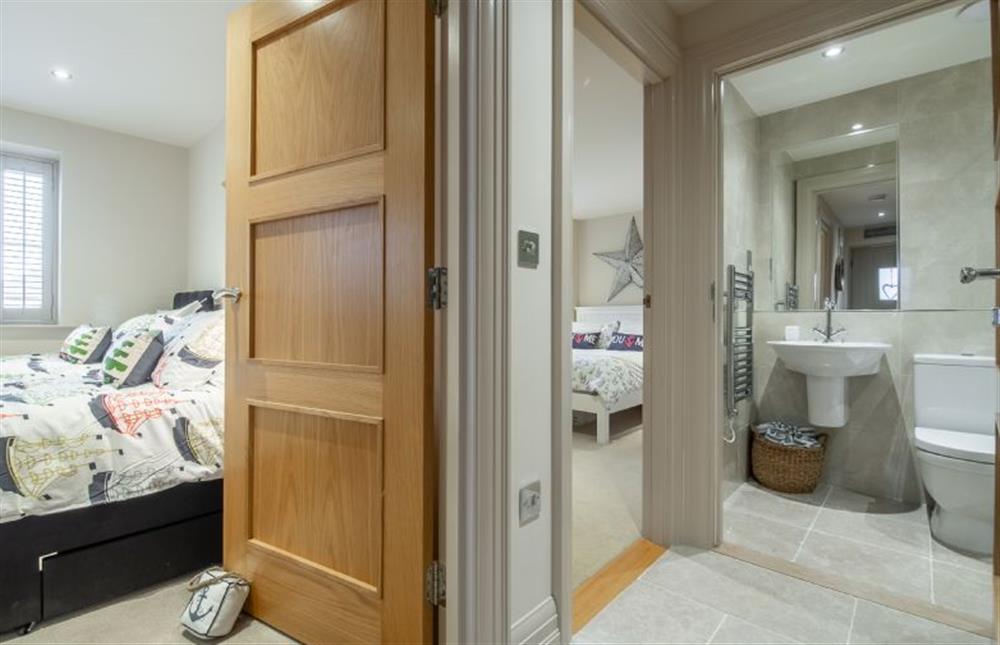 Ground floor: Hall view to bedrooms and bathroom at Tucked Away Cottage, Langham  near Holt