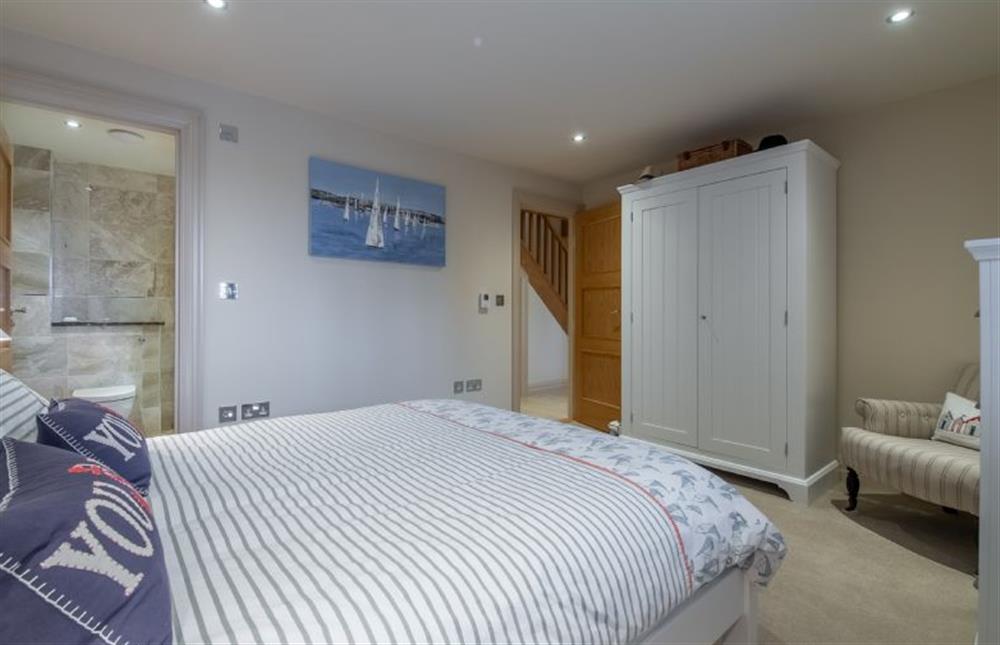 Ground floor: Master bedroom (photo 3) at Tucked Away Cottage, Langham  near Holt
