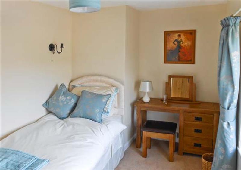 This is a bedroom at Tuckermarsh Quay River Cottage 2, Tavistock