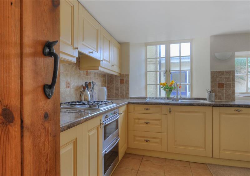 This is the kitchen (photo 2) at Tudor Cottage, Lyme Regis