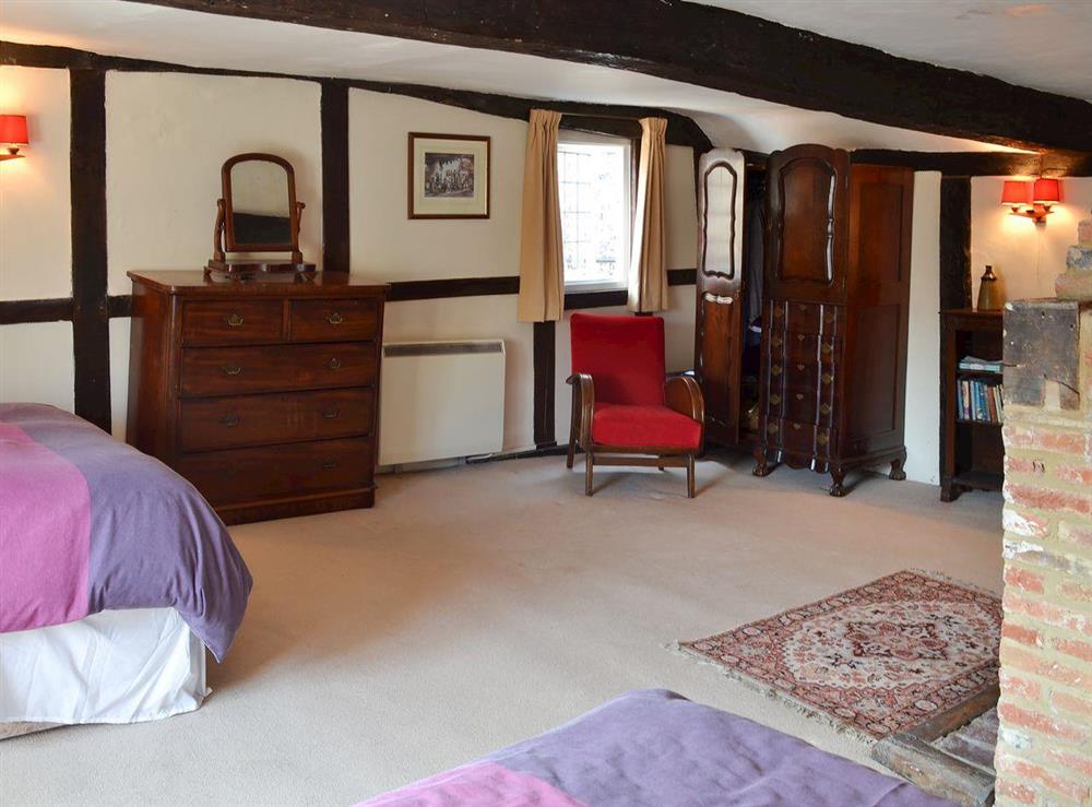 Spacious beamed bedroom at Tudor Cottage in Romsey, Hampshire