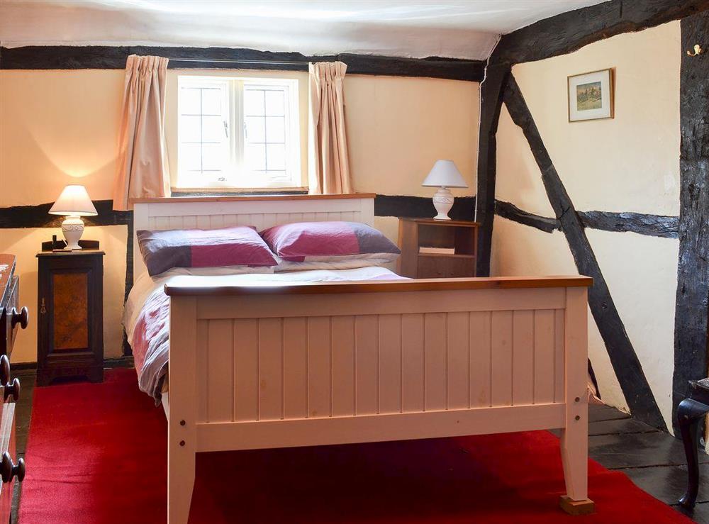 Warm and welcoming double bedroom at Tudor Cottage in Romsey, Hampshire