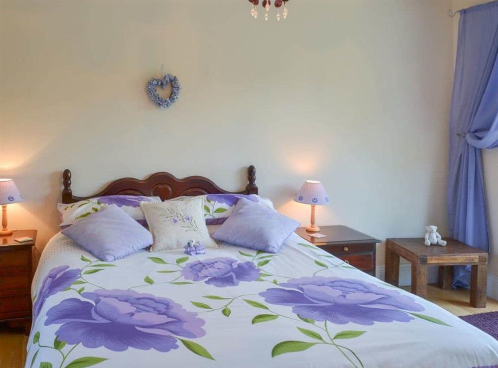 Romantic and inviting double bedroom at Tulip Lodge in Tideford Cross, near Saltash, Cornwall