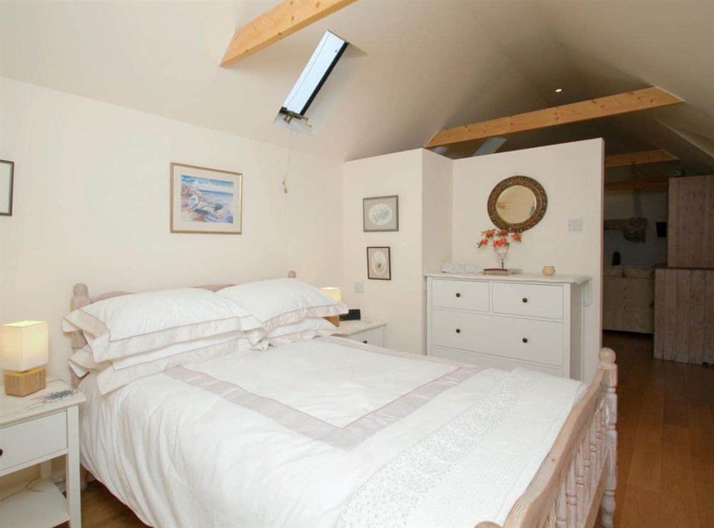 Romantic double bedroom with en-suite bathroom with large walk-in shower and toilet at Tullibole Castle Longhouse in Crook of Devon, Kinross-shire., Kinross-Shire