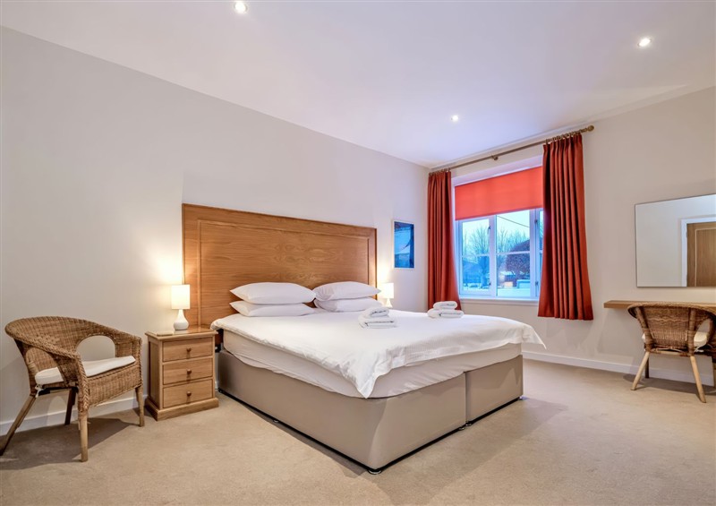 A bedroom in Tullich Apartment at Tullich Apartment, Ballater
