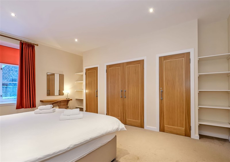 This is a bedroom (photo 2) at Tullich Apartment, Ballater