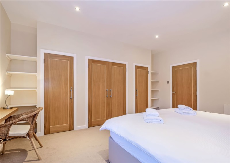 This is a bedroom (photo 3) at Tullich Apartment, Ballater