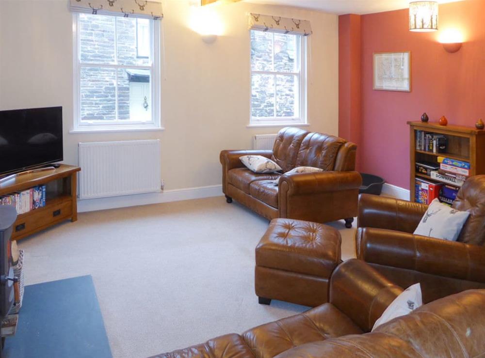 Cosy and inviting open plan living area at Tuppence Cottage in Dulverton, Somerset