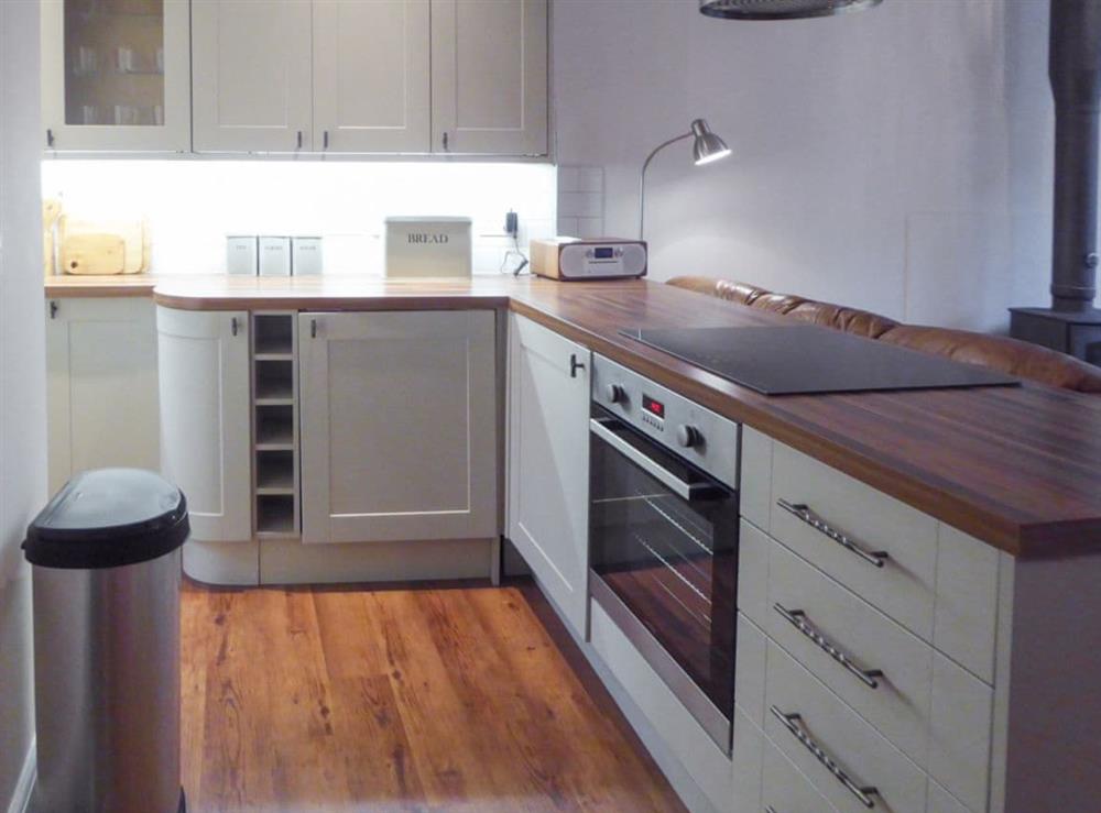L-shaped galley-style kitchen at Tuppence Cottage in Dulverton, Somerset