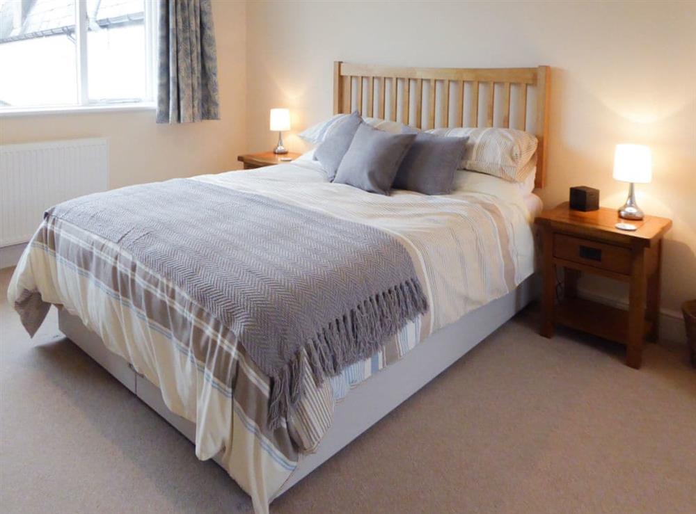 Welcoming and romantic double bedroom at Tuppence Cottage in Dulverton, Somerset