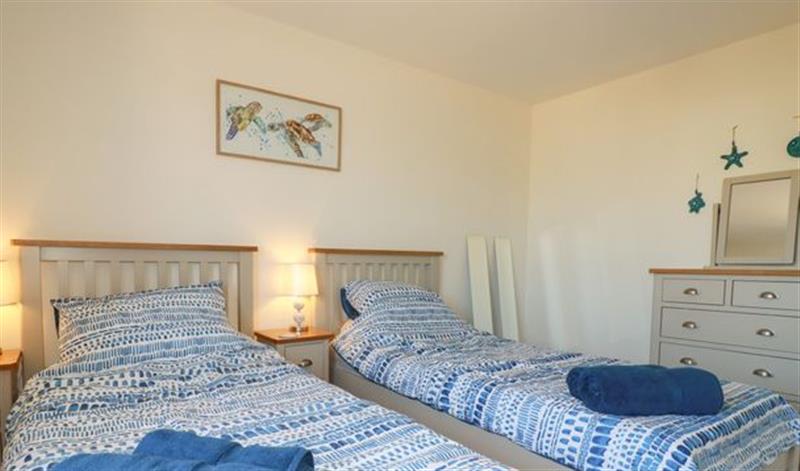 A bedroom in Turtle Cove at Turtle Cove, St Mawgan