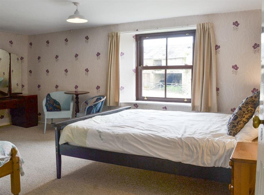 Inviting bedroom at Tutchenor Farm in Patchacott, near Beaworthy, Devon
