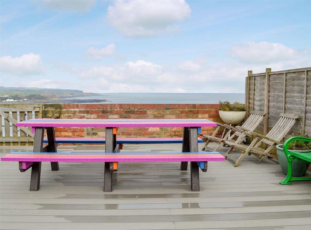 Decked sitting out area with fantastic views at Twin Bays House in Scarborough, North Yorkshire., Great Britain