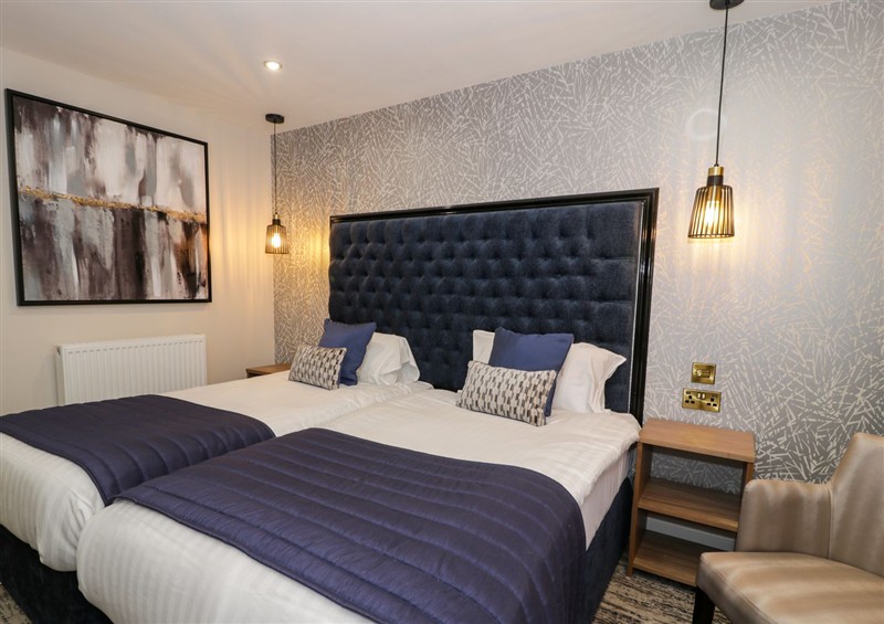 This is the bedroom at Twin Hotel Room, Dyserth