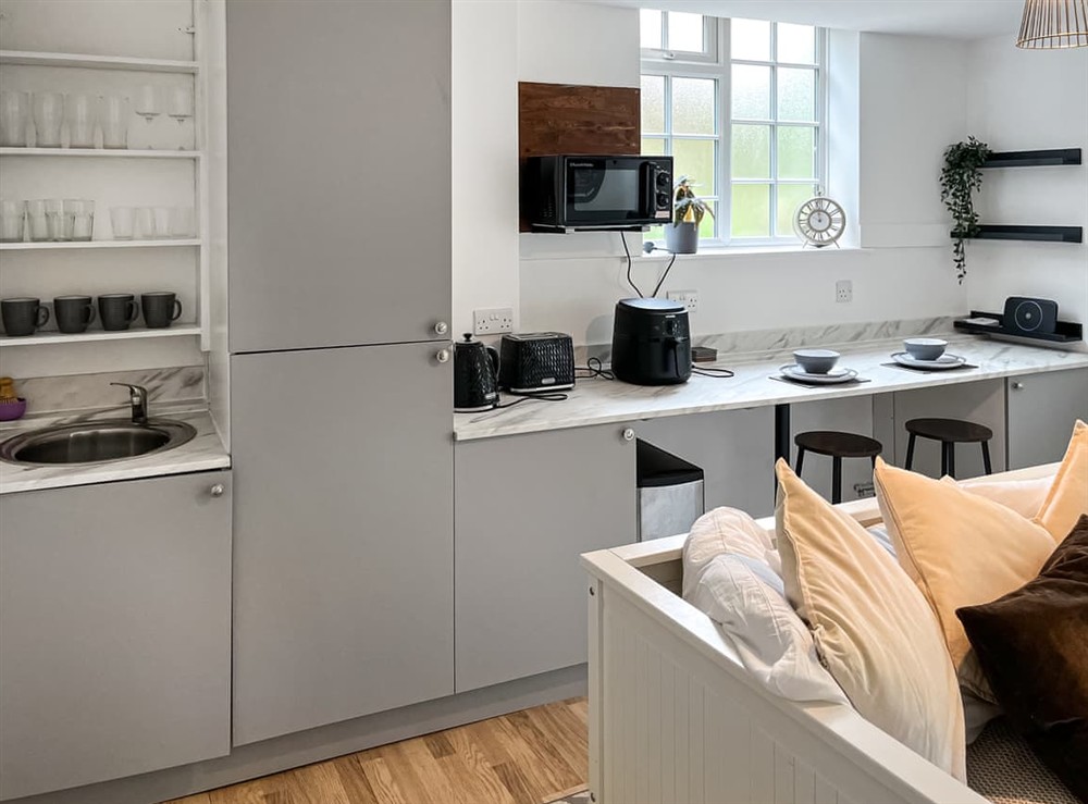 Kitchen area at Twin Pines in Kenley, near Surrey, England