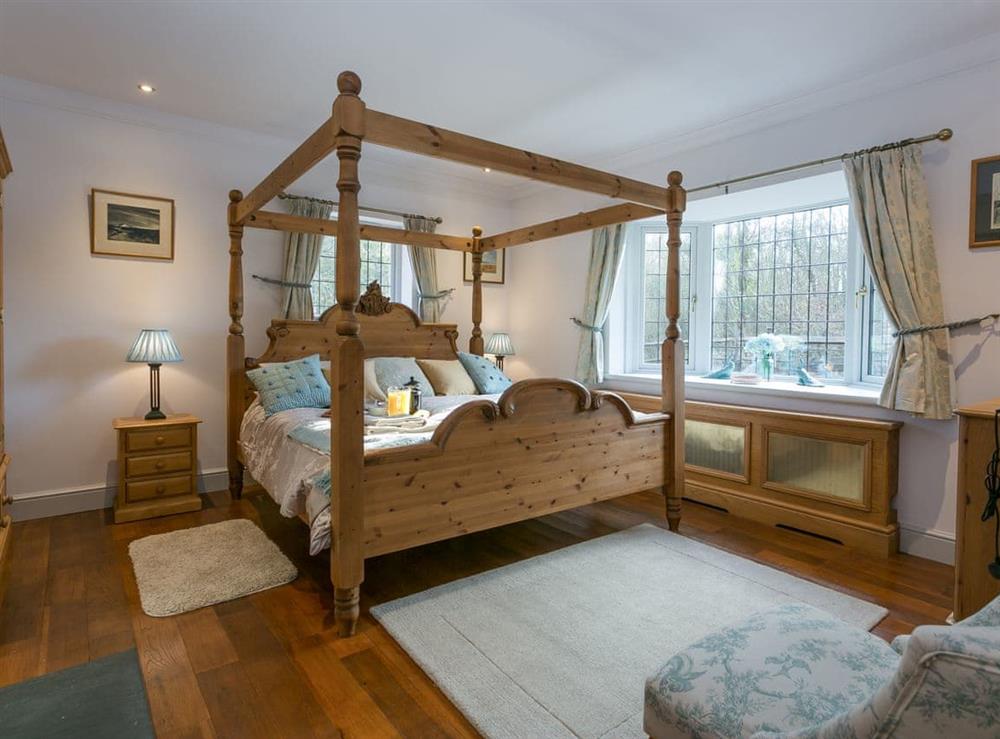 Four poster bedroom at Twisly North Lodge in Catsfield, near Battle, Sussex, East Sussex
