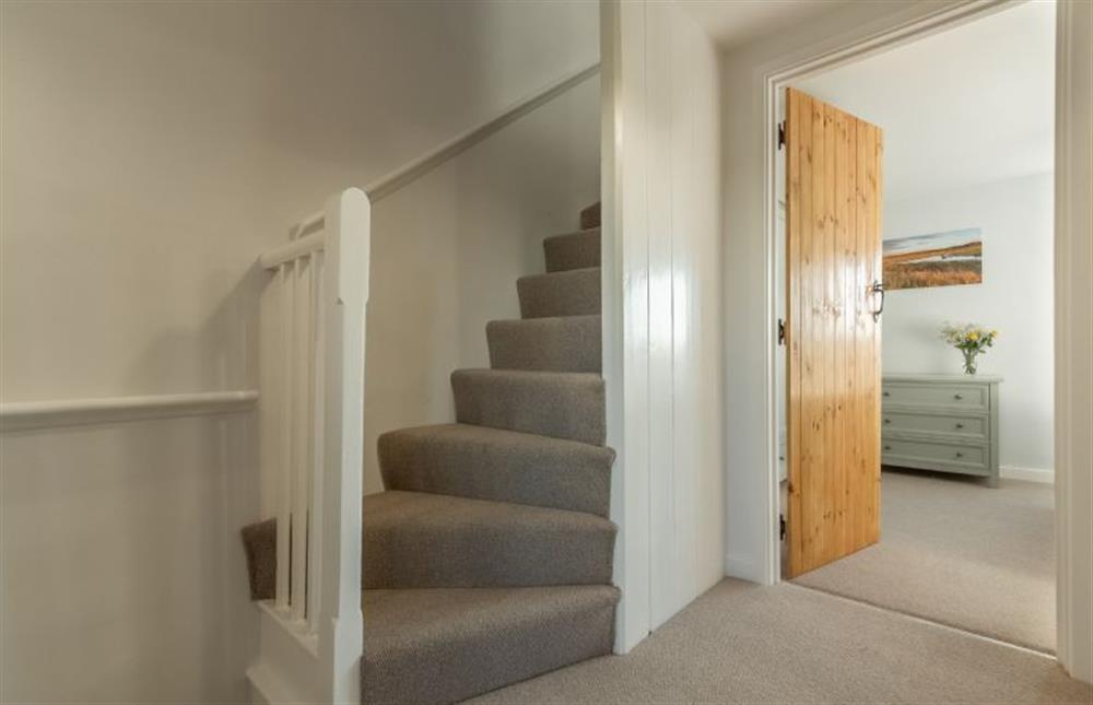 First floor: Stairs up to second floor at Twitchers Cottage, Titchwell near Kings Lynn