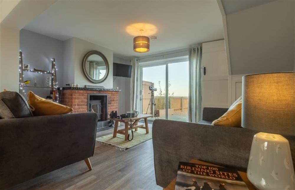 Ground floor: Light and airy sitting room at Twitchers Cottage, Titchwell near Kings Lynn