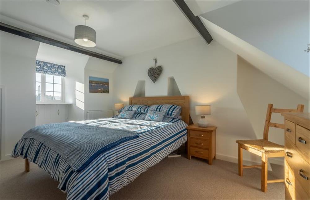 Second floor: King-size bedroom at Twitchers Cottage, Titchwell near Kings Lynn