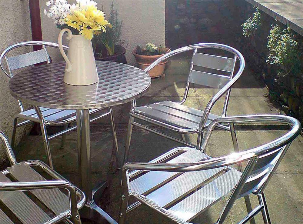 Patio table and chairs at Two Chimneys in Keswick, Cumbria