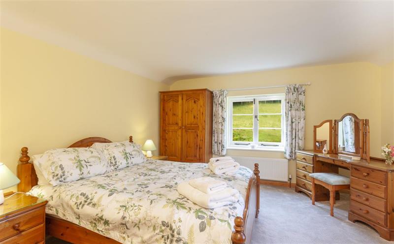 A bedroom in Two Lower Spire Cottage at Two Lower Spire Cottage, Nr Dulverton