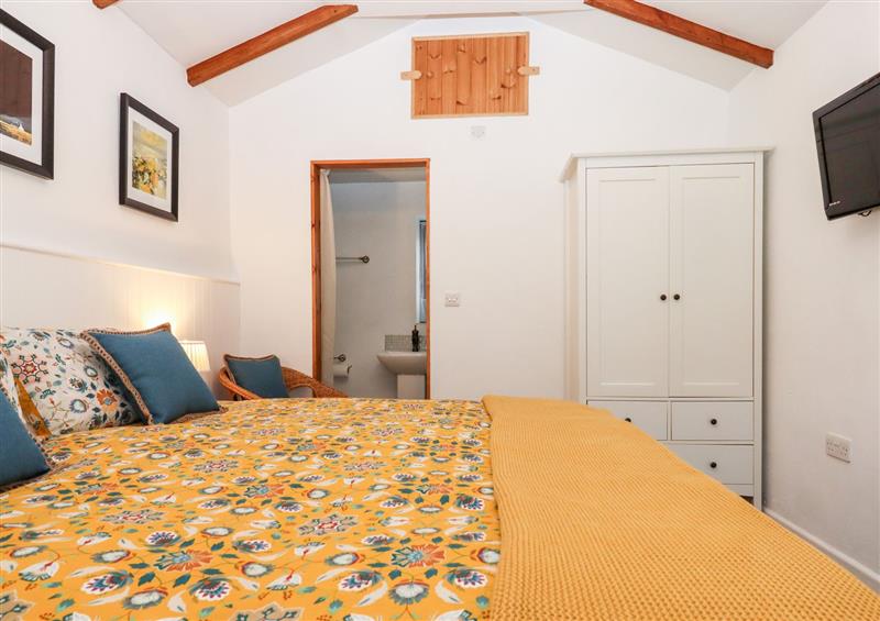 This is a bedroom (photo 3) at Two Shoes Cottage, Sourton near Sourton Down