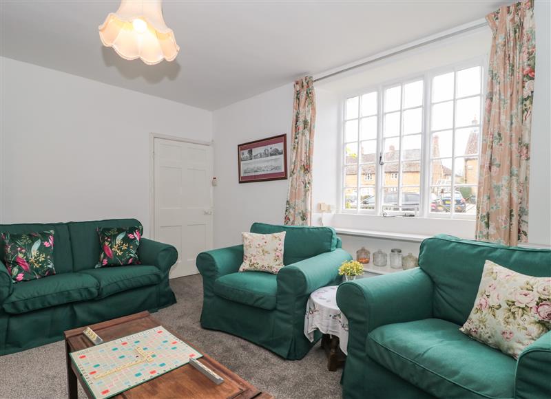 Relax in the living area at Two Towers Cottage, Montacute