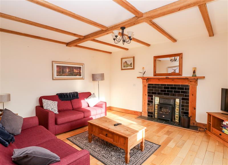 Enjoy the living room at Twyford Farm Cottage, Tiverton
