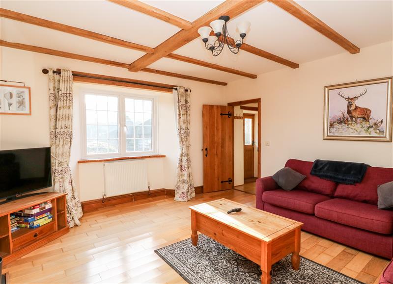 Relax in the living area at Twyford Farm Cottage, Tiverton