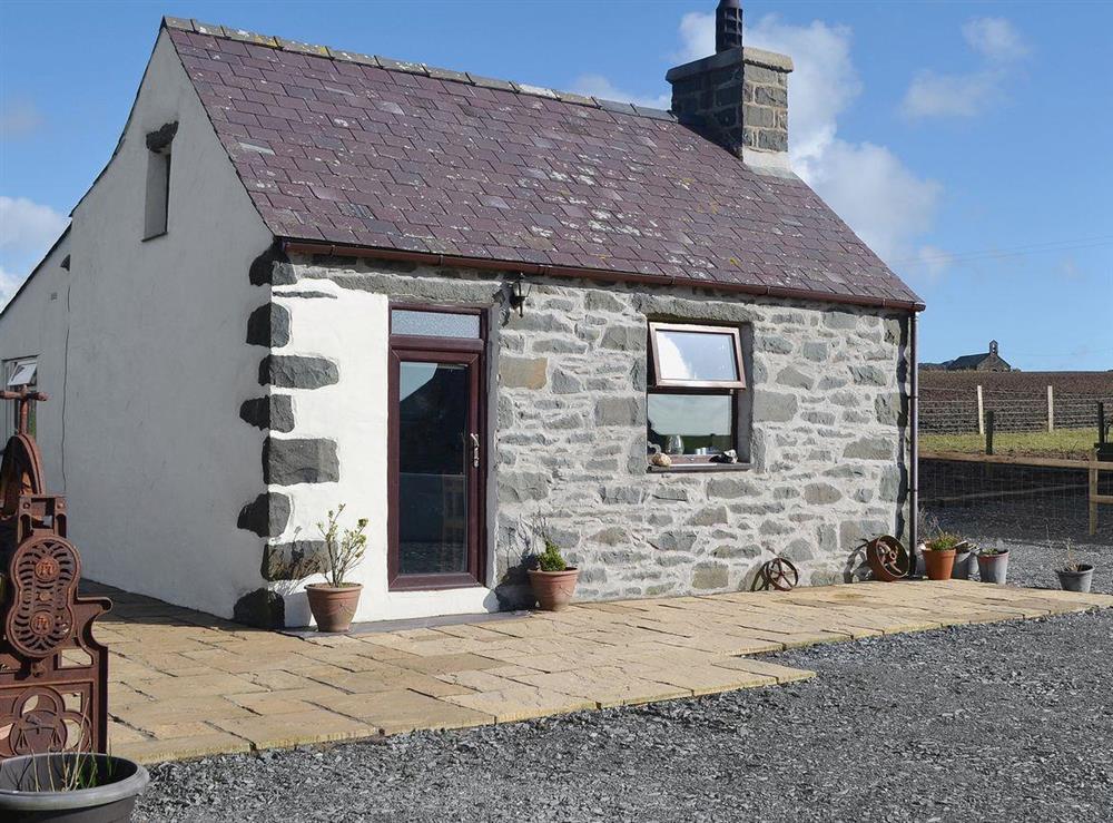 Situated on a working farm this single storey cottages oozes charm