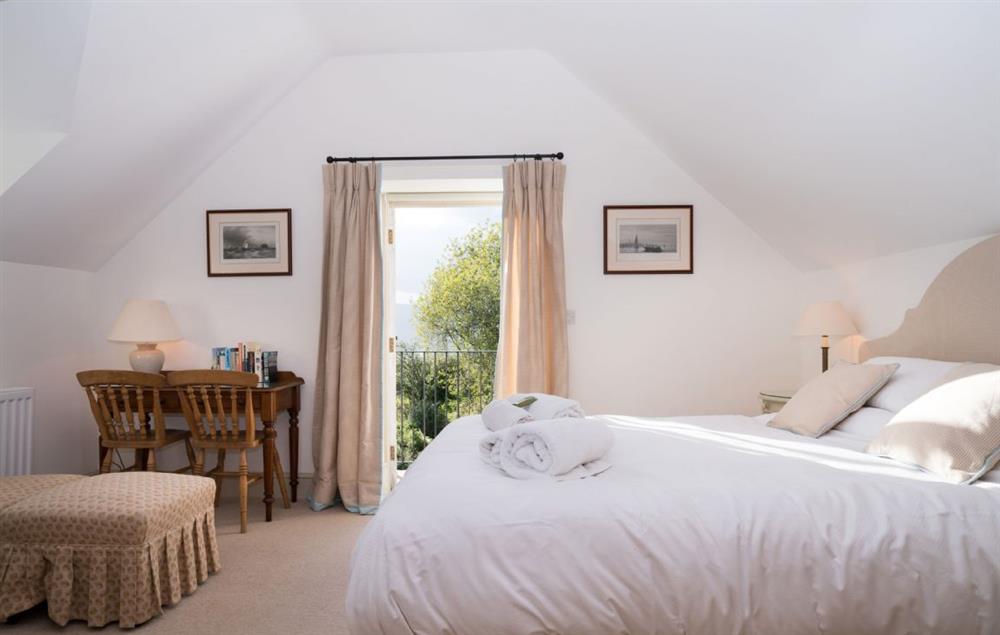 Double bedroom with 5’ bed at Ty Cerrig, Bodnant Estate