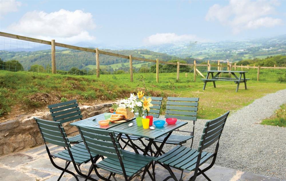 Large enclosed garden and terrace with spectacular views at Ty Cerrig, Bodnant Estate